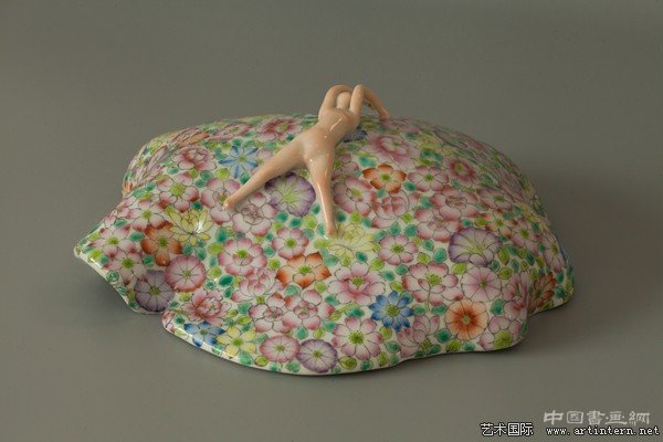 评李玉端的陶瓷雕塑
